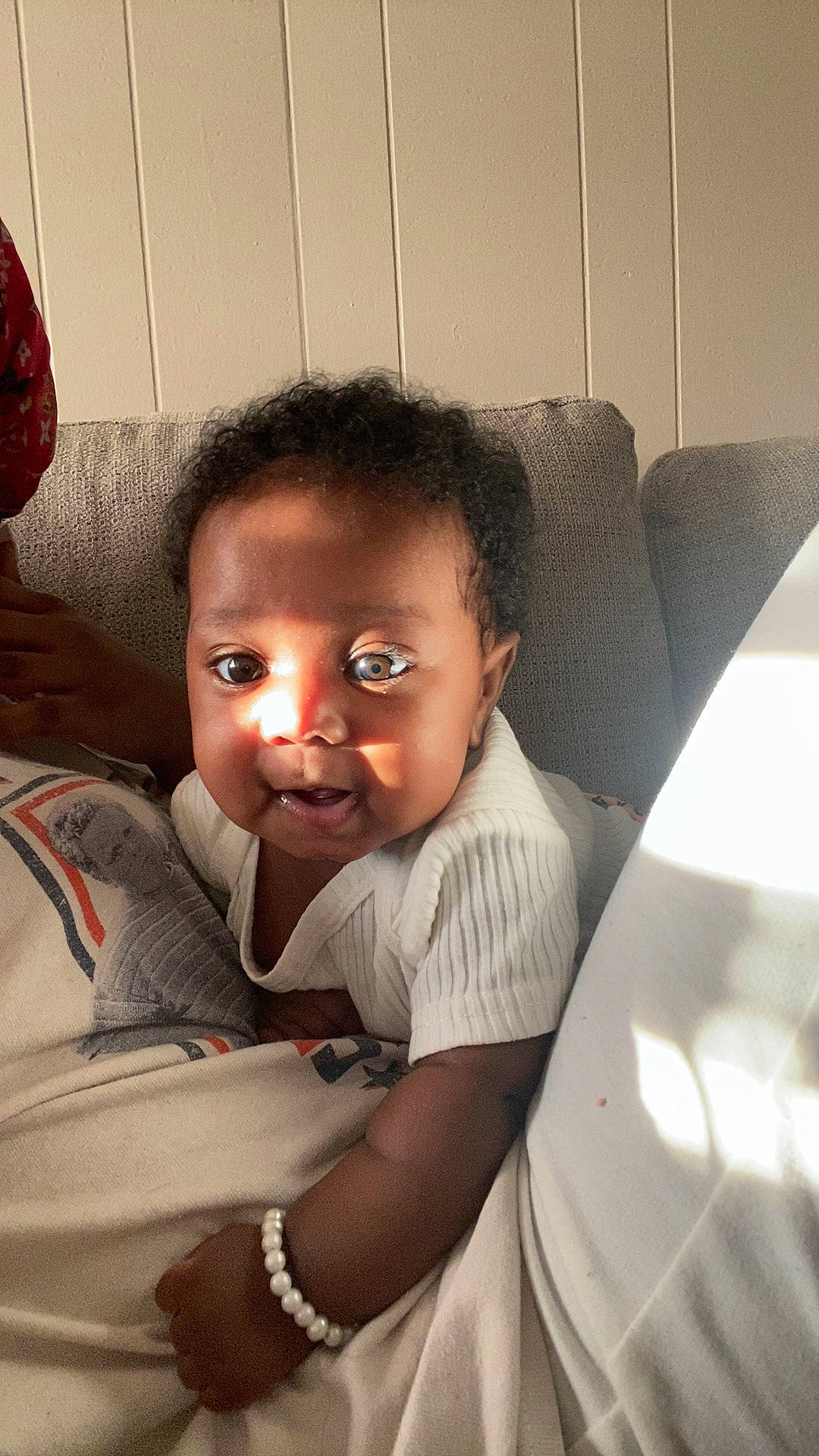 Arianna Davis joined the competition — help win amazing prizes! arm, black_hair, cheek, child, comfort, elbow, flash_photography, flooring, forehead, fun, happy, lip, neck, nose, person, room, sitting, smile, t_shirt, toddler