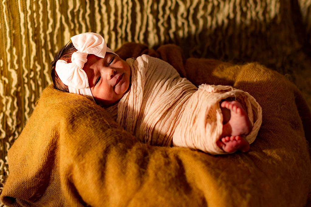 Evie joined the competition — help win amazing prizes! baby, bedding, bedtime, child, comfort, face, flesh, fur, grass, headgear, headwear, human_leg, linens, person, room, sitting, skin, sleeve, sunglasses, textile