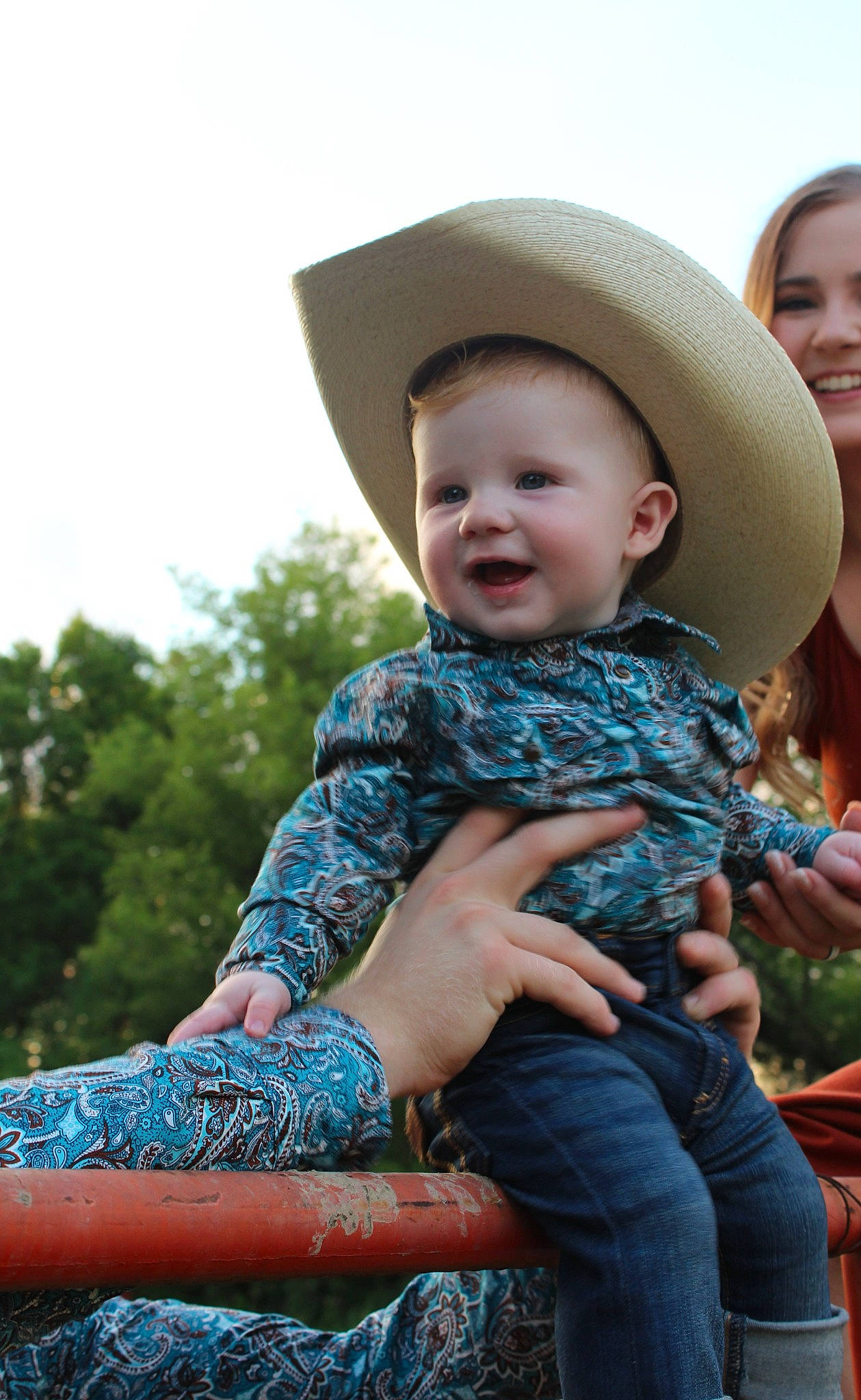 Jaxton is registered to the contest to win money with this photo: child, cool, cowboy_hat, eye, face, fashion_accessory, flash_photography, fun, grass, happy, hat, joy, leisure, pattern, person, plant, sitting, sleeve, smile, sun_hat