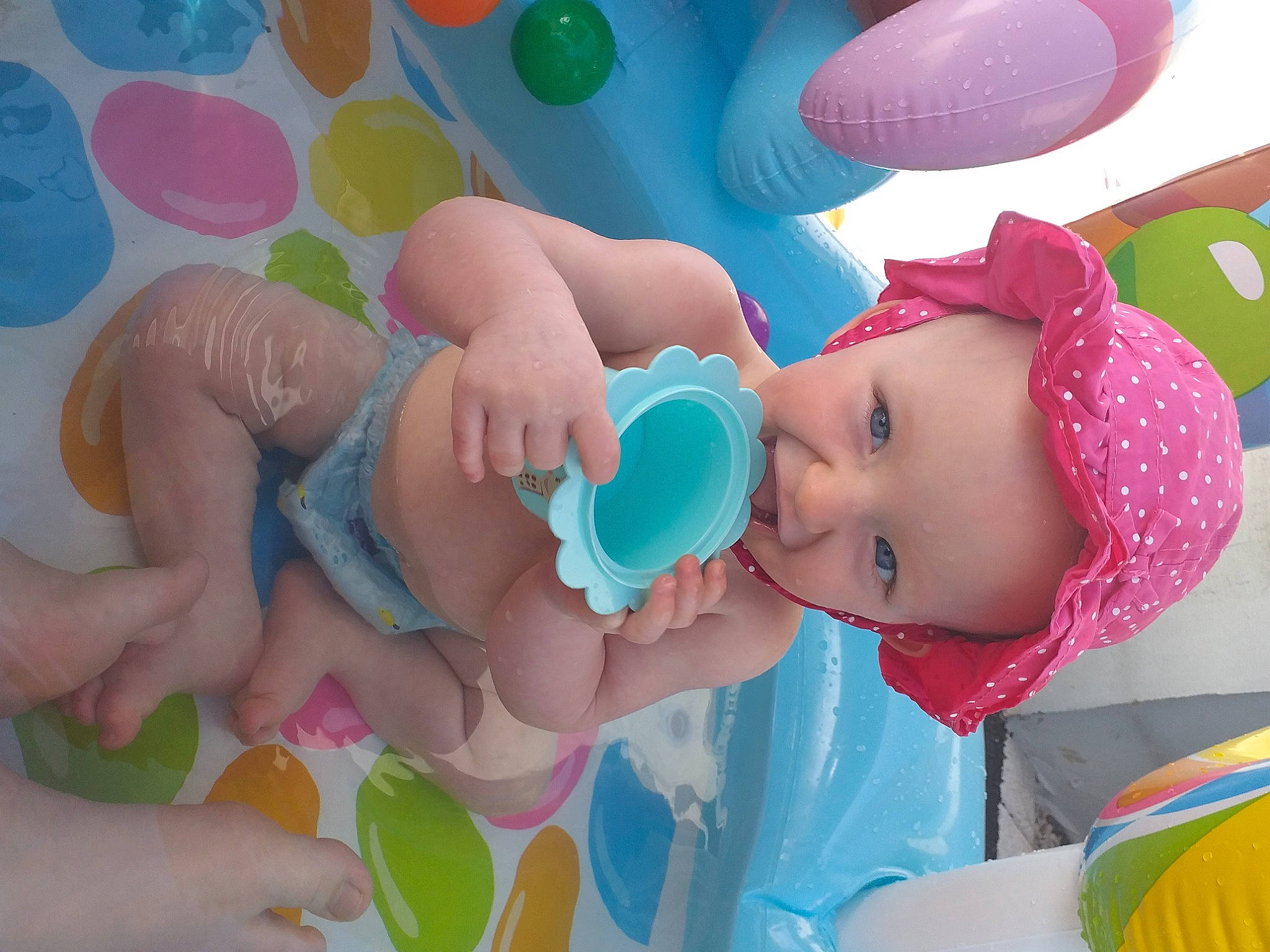 Elyne participe au concours pour gagner de l'argent avec cette photo : aqua, azure, baby, baby_products, baby_toddler_clothing, blue, cheek, child, fun, gesture, happy, mouth, party_supply, person, pink, skin, snapshot, summer, textile, toddler