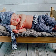 Cason is registered to the contest to win money with this photo: baby, child, comfort, couch, furniture, leg, nap, sitting, sleep, toddler