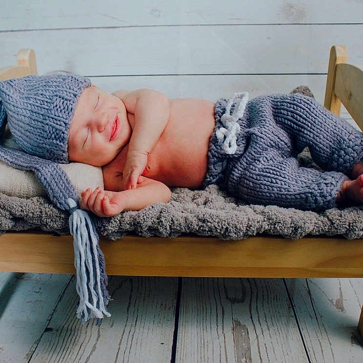 Cason is registered to the contest to win money with this photo: baby, child, comfort, couch, furniture, leg, nap, sitting, sleep, toddler