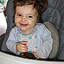 toddler, child, smile, happy, high_chair, avocado, curly_hair, pigtails, indoor, window, natural_light, baby_clothing, face, person, cute, playful, food, furniture, portrait, infant