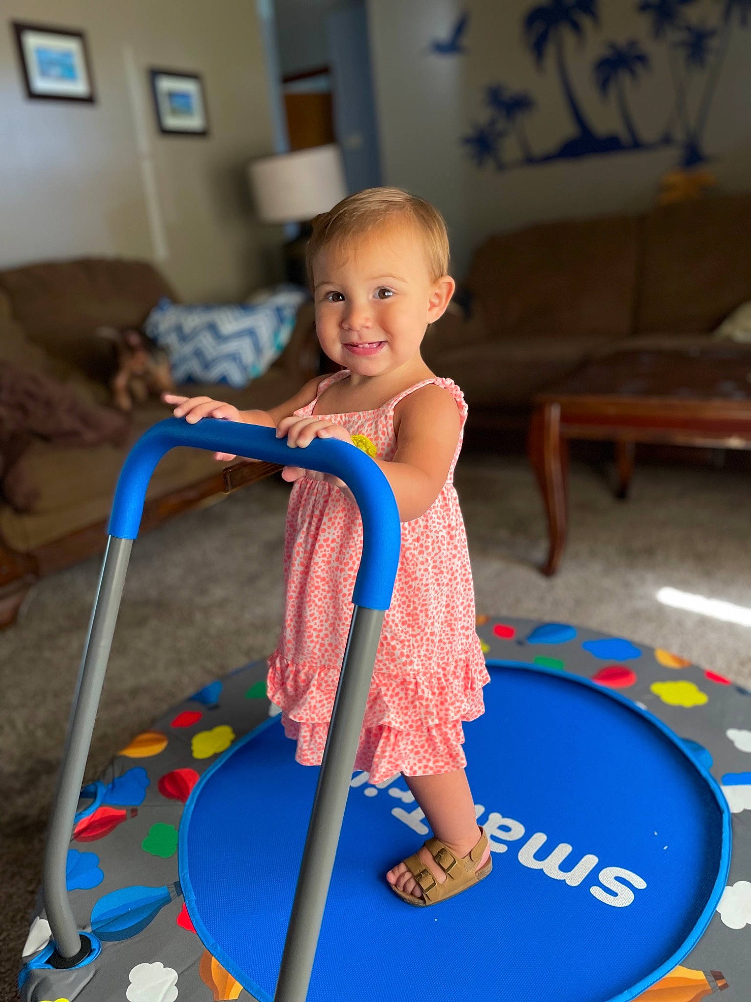 Lexi joined the competition — help win amazing prizes! balance, blue, child, couch, electric_blue, floor, flooring, fun, games, happy, human_leg, joy, leisure, person, picture_frame, play, recreation, smile, sports_toy, toddler