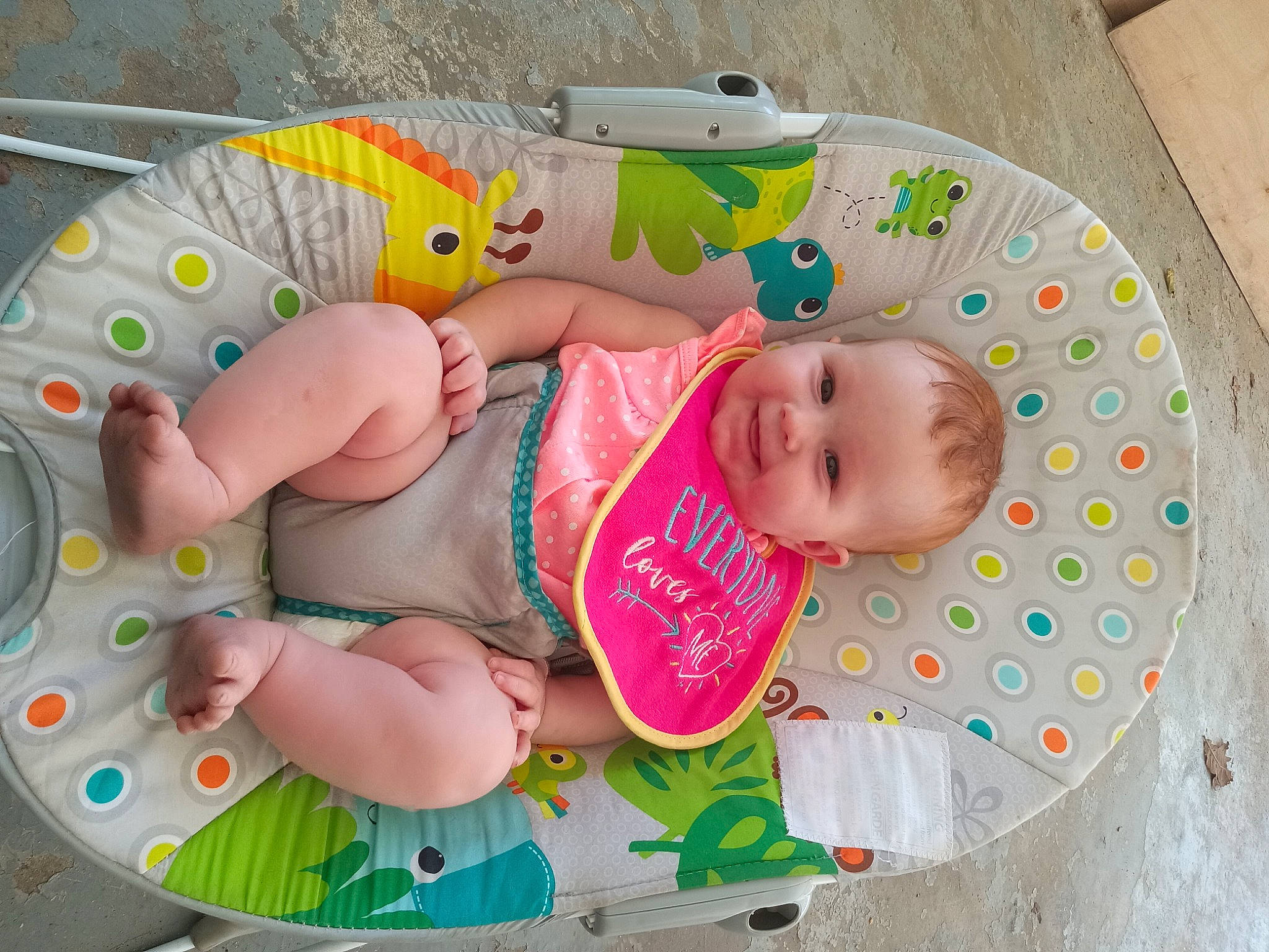 Raven is registered to the contest to win money with this photo: baby, baby_products, baby_safety, baby_toddler_clothing, baby_toys, cheek, child, circle, comfort, design, facial_expression, joy, linens, pattern, person, pink, play, product, room, skin