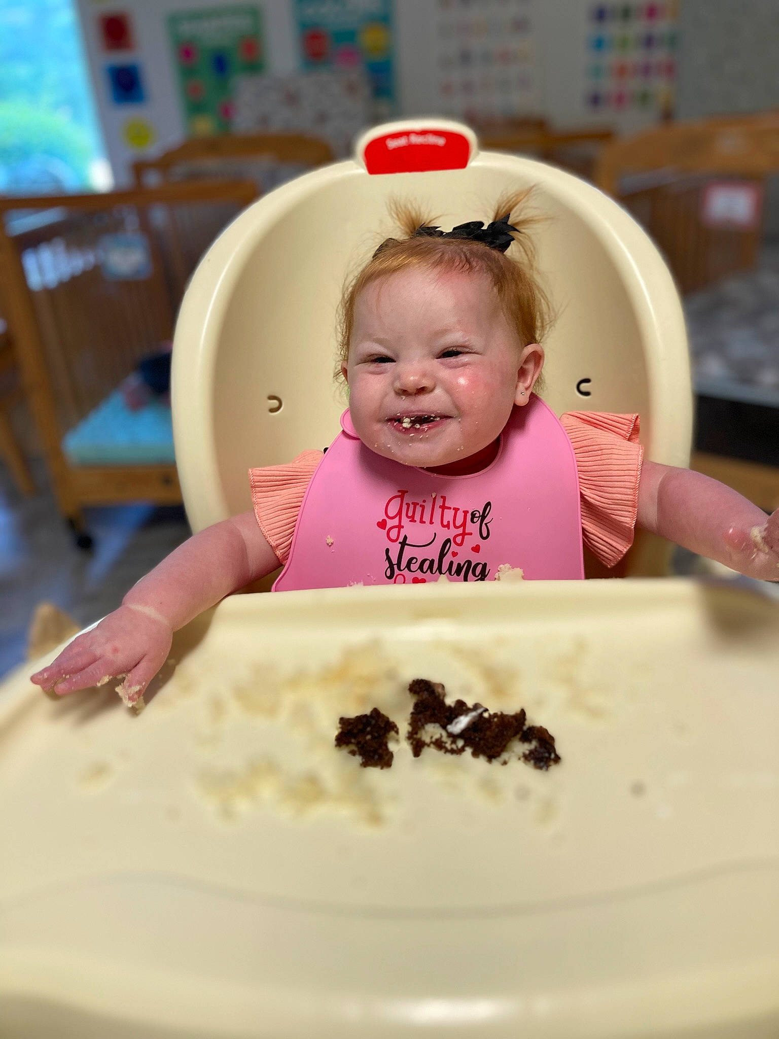Carleigh is registered to the contest to win money with this photo: baby, baby_toddler_clothing, cake, chair, child, cooking, dishware, event, food, happy, icing, ingredient, joy, person, plate, recipe, sleeve, smile, sweetness, t_shirt
