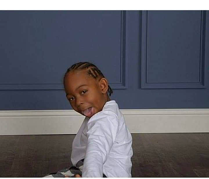 Gary is registered to the contest to win money with this photo: arm, baby, child, ear, floor, flooring, hairstyle, human, neck, person, photograph, photography, sitting, snapshot, square, toddler, white