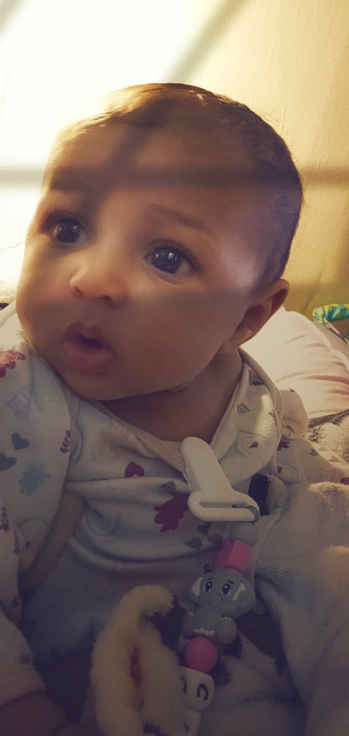 Cali is registered to the contest to win money with this photo: baby, baby_toddler_clothing, cheek, child, chin, comfort, ear, eyebrow, eyelash, forehead, fun, happy, iris, jaw, lip, mouth, nose, person, skin, sleeve