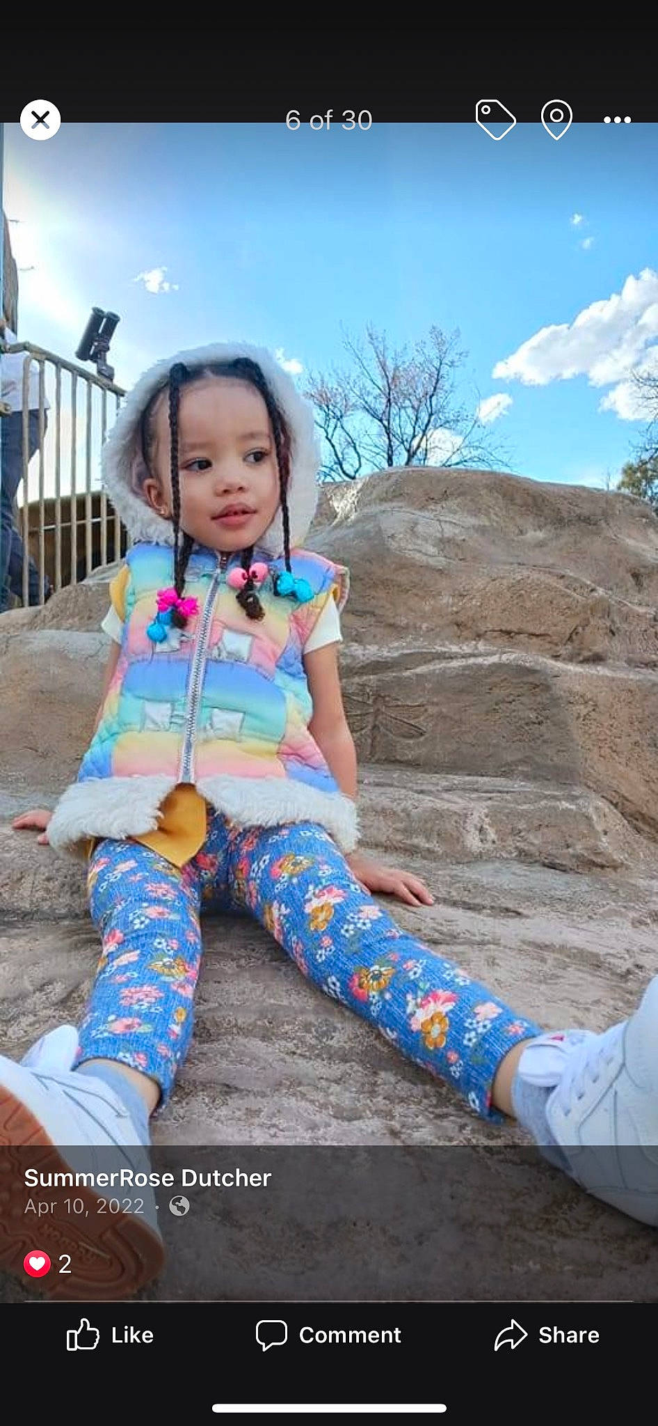 Princess is registered to the contest to win money with this photo: baby_toddler_clothing, child, cloud, cool, electric_blue, fashion_accessory, flash_photography, fun, grass, happy, human_leg, leisure, pattern, person, sitting, sky, sleeve, sock, thigh, toddler