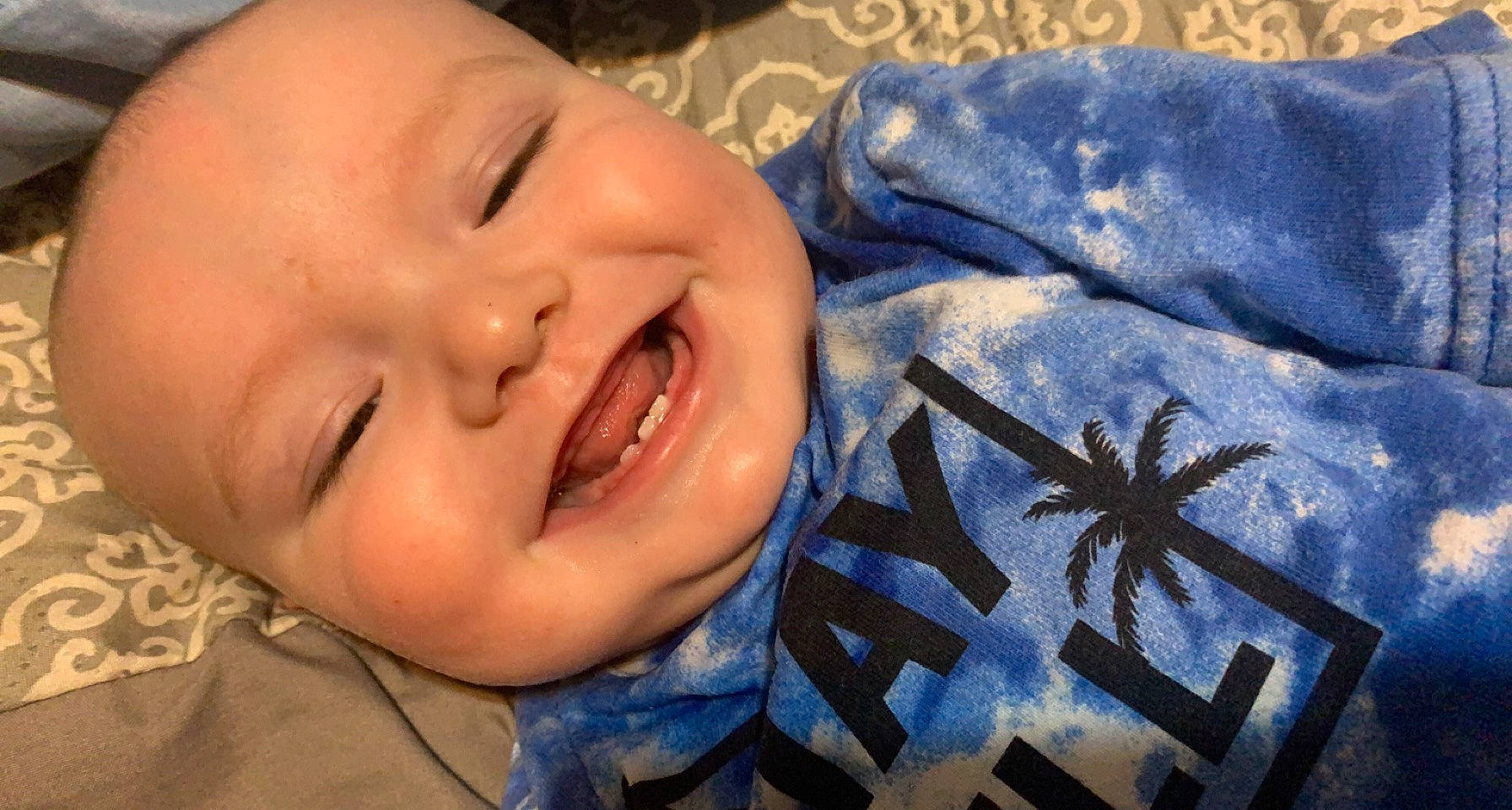 Jaylen joined the competition — help win amazing prizes! baby, baby_laughing, baby_toddler_clothing, cheek, child, comfort, cool, electric_blue, finger, grass, happy, iris, joy, lip, mouth, nose, person, product, skin, smile