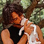 Minotaure participe au concours pour gagner de l'argent avec cette photo : man, cat, outdoor, nature, affection, curly_hair, black_shirt, pet, animal, tree, greenery, love, holding, kiss, white_cat, portrait, closeup, human, skin, arm