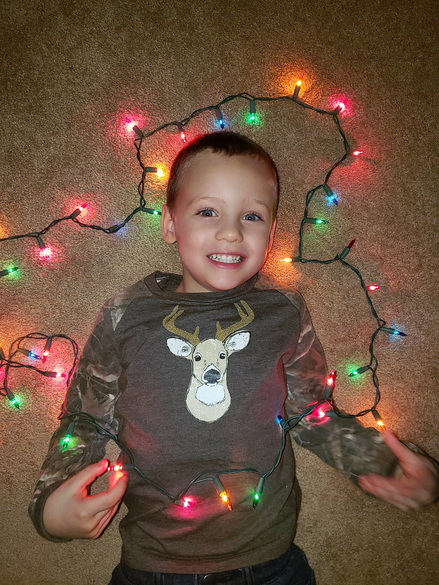 David Ray is registered to the contest to win money with this photo: christmas, christmas_decoration, christmas_ornament, cool, darkness, event, facial_expression, flash_photography, fun, happy, holiday, holiday_ornament, joy, lighting, midnight, ornament, person, smile, space, standing