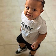 Noah joined the competition — help win amazing prizes! child, toddler, baby, portrait, sunglasses, smiling, face, standing, indoors, tiled_floor, white_shirt, graphic_shirt, black_shorts, sneakers, fashion, cute, looking_at_camera, candid, full_body, photography