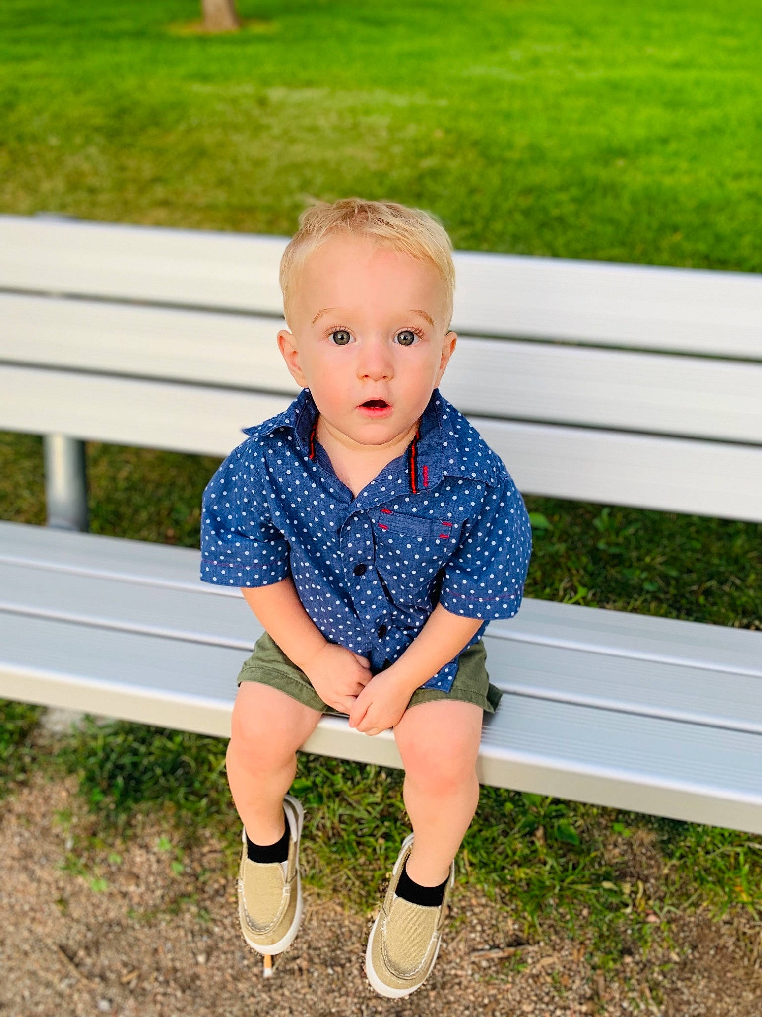 Azriel joined the competition — help win amazing prizes! baby, baby_toddler_clothing, child, denim, family, footwear, grass, leg, pattern, person, photography, plant, shoe, sitting, summer, surprise, t_shirt, toddler, vacation