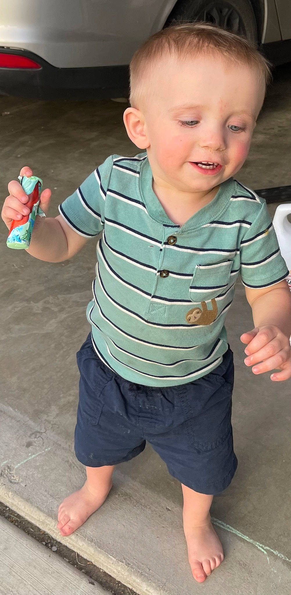 Bentley is registered to the contest to win money with this photo: arm, cheek, chin, eye, face, hair, hairstyle, hand, head, joint, leg, mouth, neck, nose, organ, person, photograph, shorts, shoulder, skin