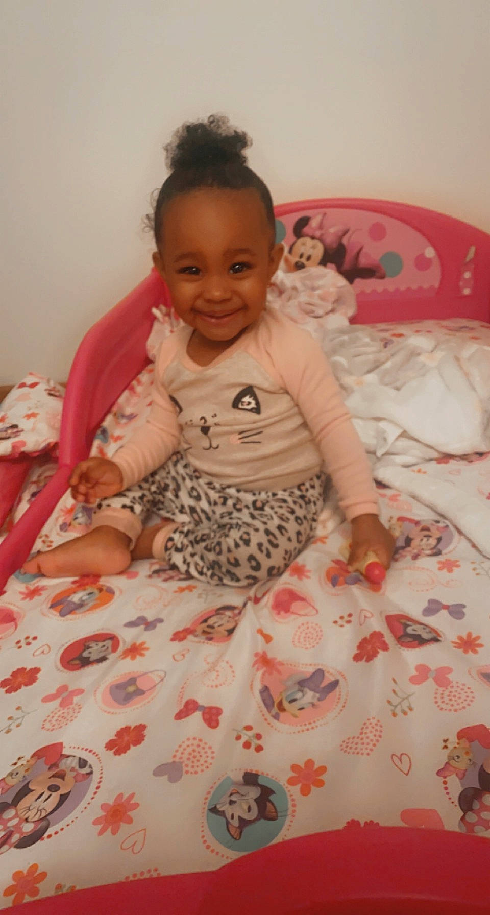 Kamiya is registered to the contest to win money with this photo: baby, baby_toddler_clothing, cheek, child, comfort, flooring, fun, hair, hairstyle, happy, head, joy, linens, pattern, person, pink, skin, sleeve, smile, textile