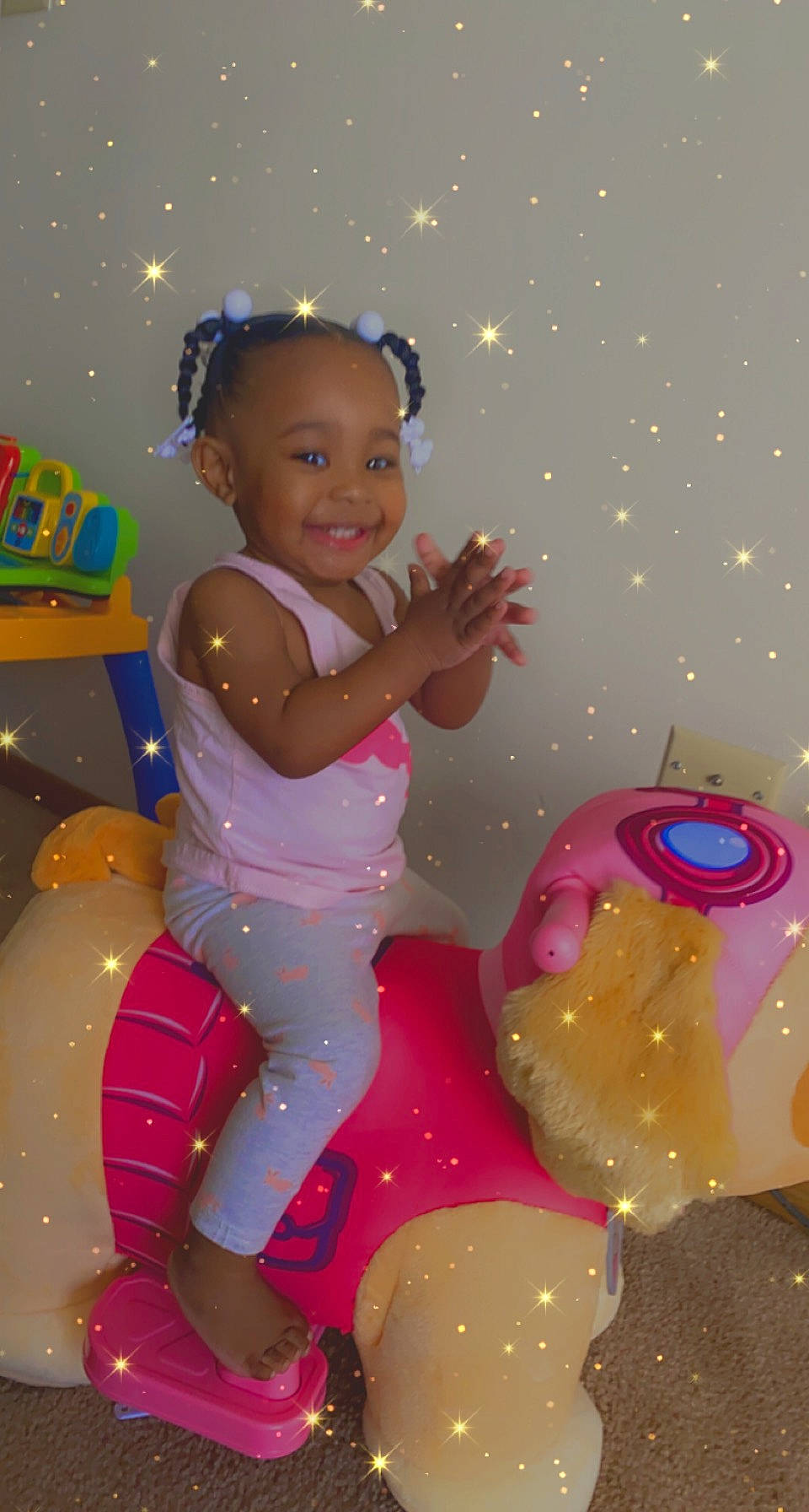 Kamiya is registered to the contest to win money with this photo: arm, baby, baby_toddler_clothing, child, design, dress, event, fun, happy, head, human_body, joy, magenta, party_supply, person, pink, purple, sitting, smile, standing