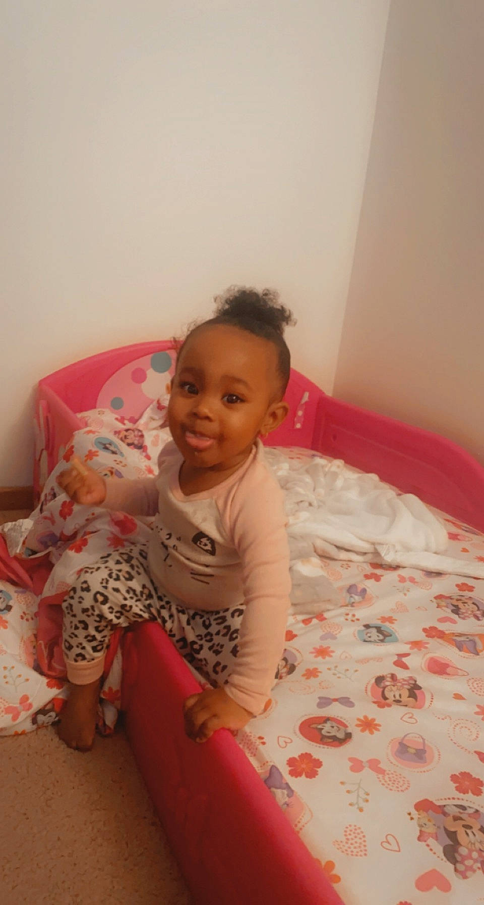 Kamiya is registered to the contest to win money with this photo: arm, baby, baby_toddler_clothing, cheek, child, comfort, floor, flooring, fun, happy, human_leg, leg, linens, person, pink, sitting, skin, sleeve, smile, thigh