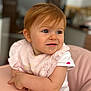 baby, child, highchair, bib, pink, face, blue_eyes, messy, curly_hair, clothing, indoor, skin, expression, cute, portrait, sitting, infant, feeding, hands, pink_highchair