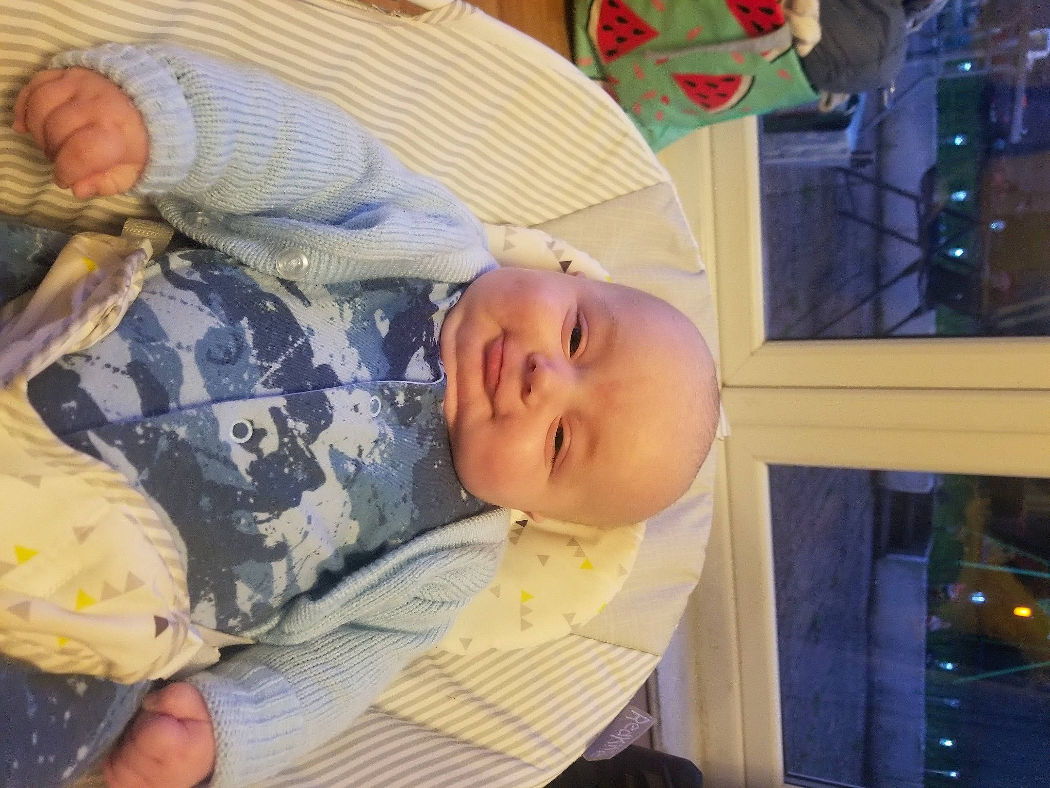 Parker is registered to the contest to win money with this photo: baby, baby_products, baby_toddler_clothing, child, comfort, happy, hat, pattern, person, product, room, skin, smile, toddler