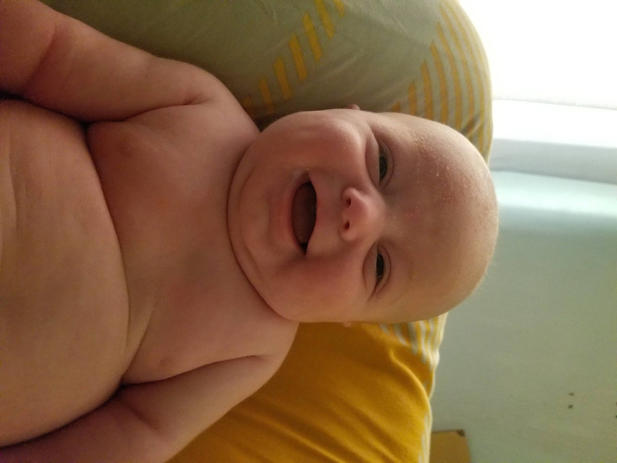 Parker is registered to the contest to win money with this photo: arm, cheek, comfort, eye, eyebrow, eyelash, face, hand, happy, head, human_body, iris, lip, mouth, neck, nose, person, shoulder, skin, smile