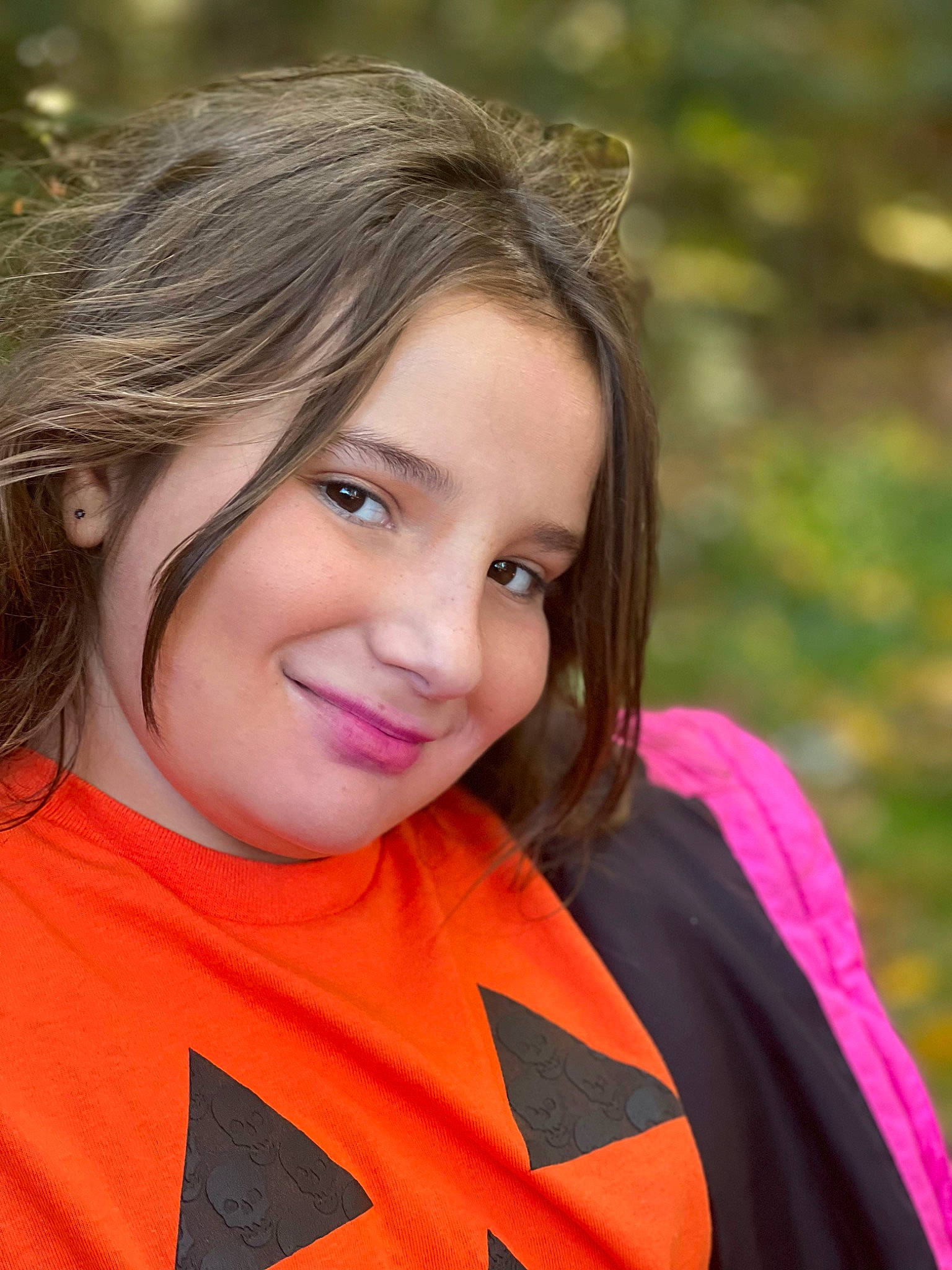 Autumn is registered to the contest to win money with this photo: brown_hair, child, event, fun, grass, hair_coloring, happy, joy, leisure, lip, long_hair, magenta, orange, outerwear, people_in_nature, person, portrait, portrait_photography, recreation, smile