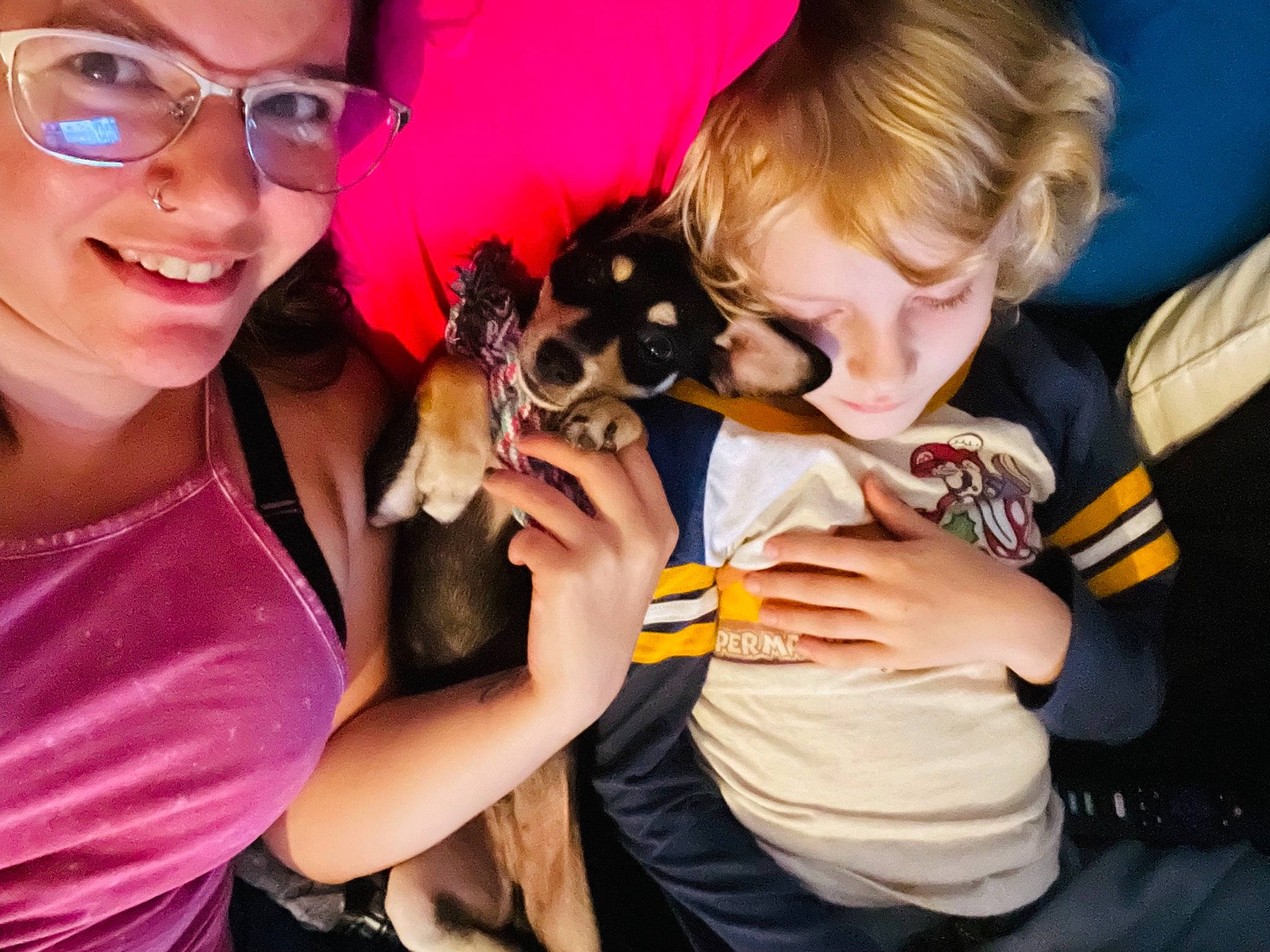 Luka is registered to the contest to win money with this photo: carnivore, child, companion_dog, dog, dog_breed, ear, event, eyewear, fawn, finger, fun, gesture, happy, leisure, smile, t_shirt, toy, toy_dog, vertebrate, vision_care