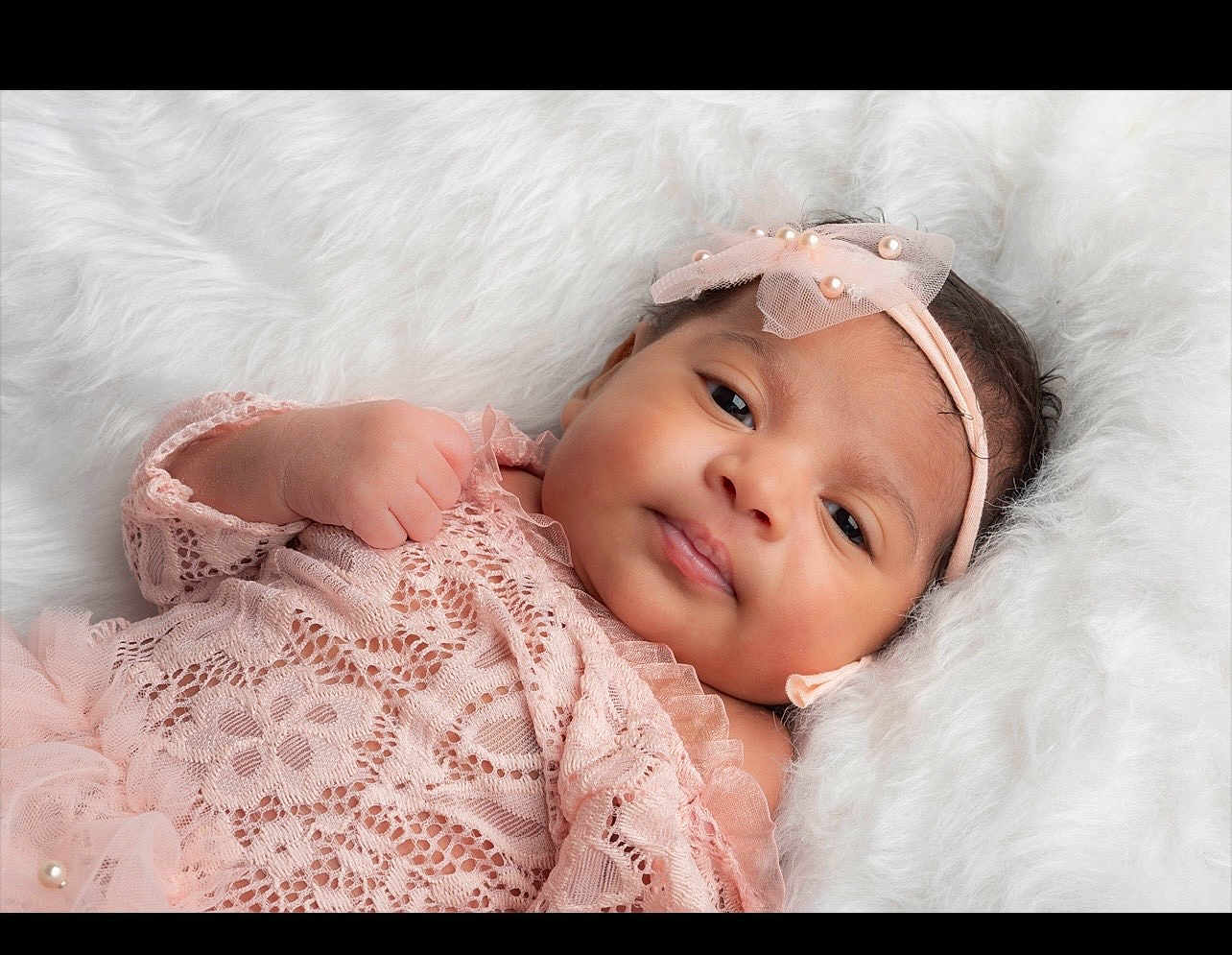 Nova is registered to the contest to win money with this photo: baby, infant, pink_lace, headband, pearls, soft_texture, white_fur, portrait, cute, child, newborn, sleepy, closeup, face, skin, hand, lying_down, adorable, fashion, toddler