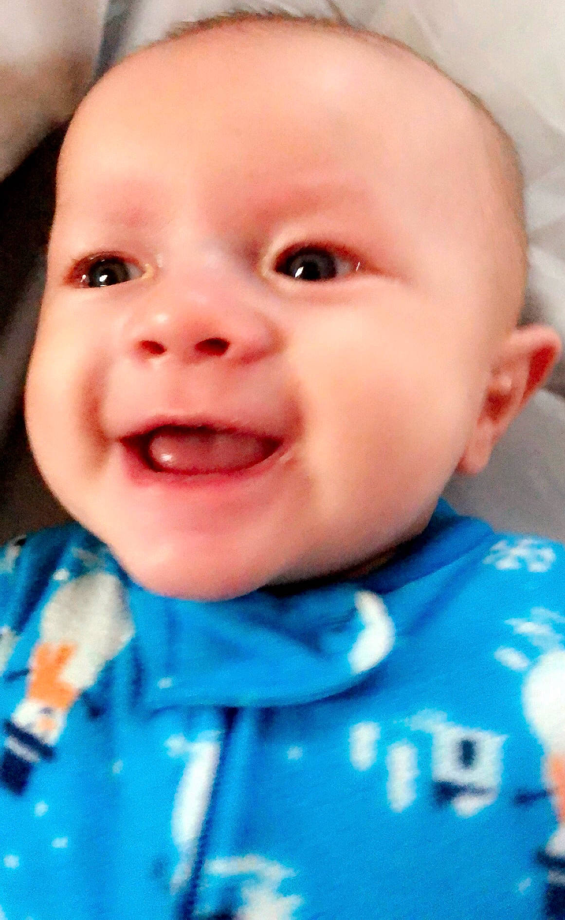 Caysen is registered to the contest to win money with this photo: baby, baby_making_funny_faces, blue, cheek, child, chin, close_up, eye, eyebrow, face, facial_expression, forehead, head, laugh, lip, mouth, nose, person, skin, smile