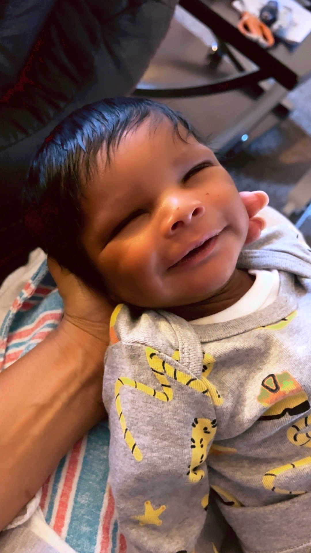 Leeangelo joined the competition — help win amazing prizes! baby, smile, infant, hand, blanket, clothing, onesie, pattern, striped, comfort, resting, closeup, face, hair, happy, cute, skin, portrait, indoors, cozy