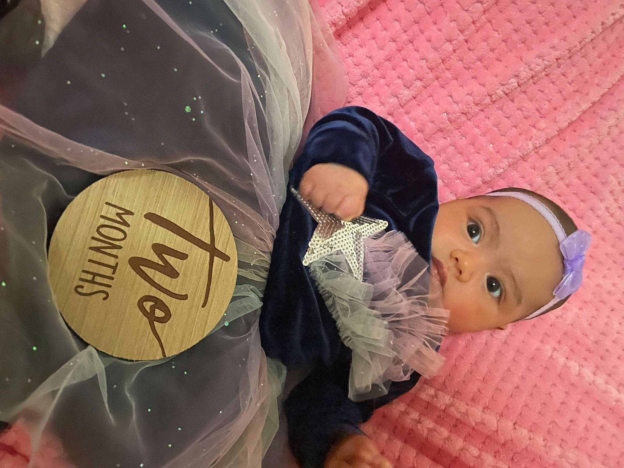 Emiliana joined the competition — help win amazing prizes! baby, baby_products, baby_toddler_clothing, bag, car_seat, cheek, child, circle, comfort, fashion_accessory, finger, glasses, hat, headgear, human_leg, linens, person, sitting, skin, textile