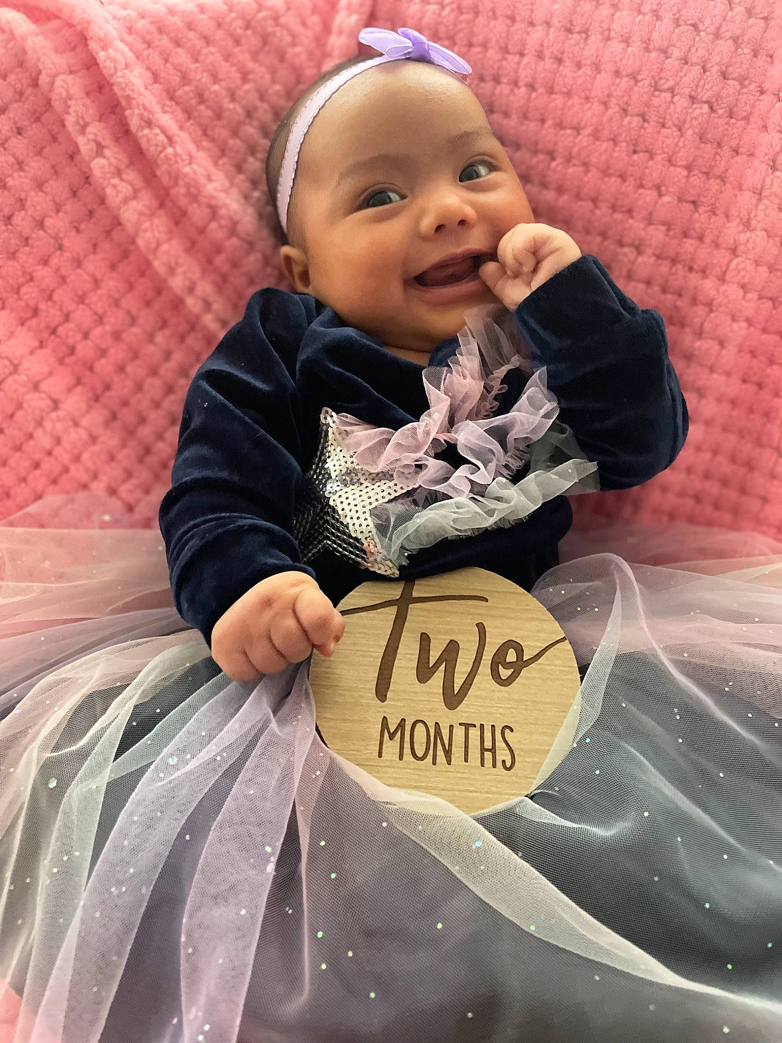 Emiliana joined the competition — help win amazing prizes! baby, baby_laughing, baby_toddler_clothing, cheek, child, comfort, cool, face, finger, fun, happy, linens, organ, person, pink, sitting, sleeve, smile, snapshot, textile