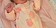 Nanyamka is registered to the contest to win money with this photo: baby, infant, crib, blanket, onesie, ladybug_pattern, sleepwear, pink, pastel_colors, bedding, stars, newborn, cute, child, sleeping, soft, comfortable, indoors, resting, person