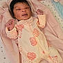 Nanyamka is registered to the contest to win money with this photo: baby, infant, crib, blanket, onesie, ladybug_pattern, sleepwear, pink, pastel_colors, bedding, stars, newborn, cute, child, sleeping, soft, comfortable, indoors, resting, person