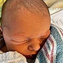 newborn, baby, sleeping, swaddled, blanket, striped, closeup, face, infant, soft, peaceful, hospital, wrapped, child, skin, head, person, cute, tiny, resting