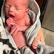 Raelon joined the competition — help win amazing prizes! newborn, baby, infant, towel, hand, skin, indoors, holding, sleepy, face, person, human, fingers, wrapping, soft, small, cute, young, child, portrait