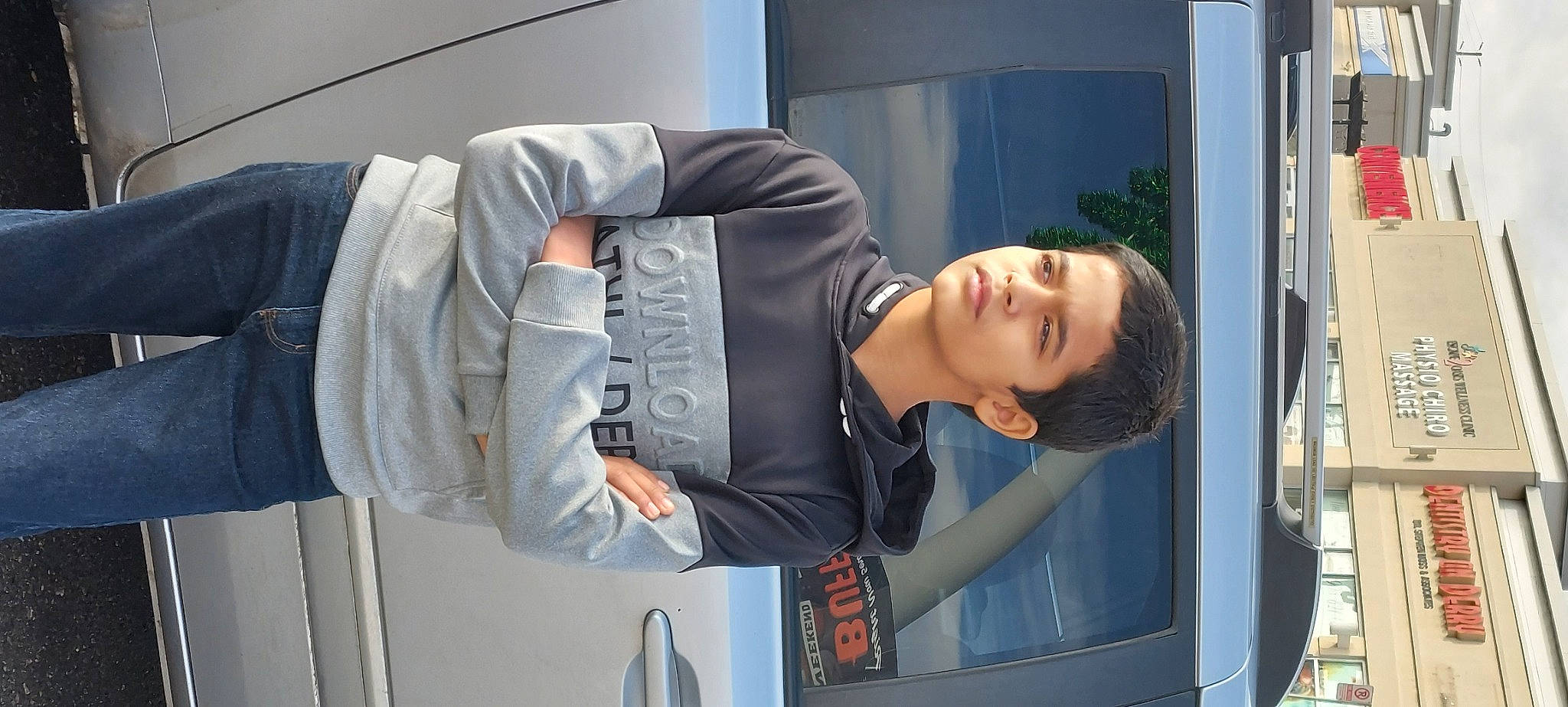 Devarsh is registered to the contest to win money with this photo: automotive_design, comfort, denim, door, dress_shirt, person, plant, room, sitting, sleeve, street_fashion, vehicle_door, waist, white_collar_worker, window