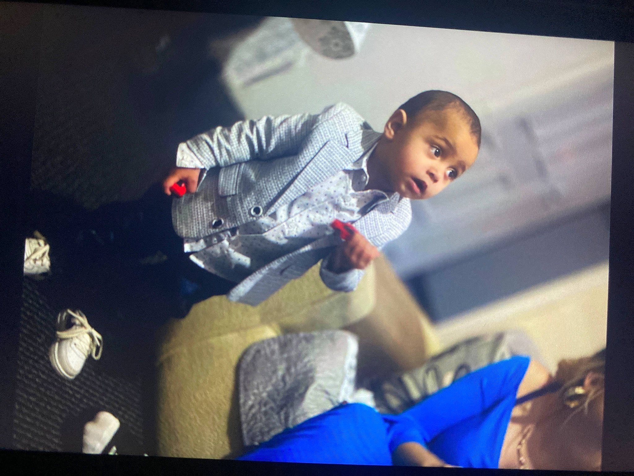 Ianis is registered to the contest to win money with this photo: auto_part, automotive_design, automotive_exterior, baby, car_seat, carmine, child, comfort, display_device, electric_blue, family_car, flash_photography, fun, luxury_vehicle, person, room, sitting, suit, surprise, toddler