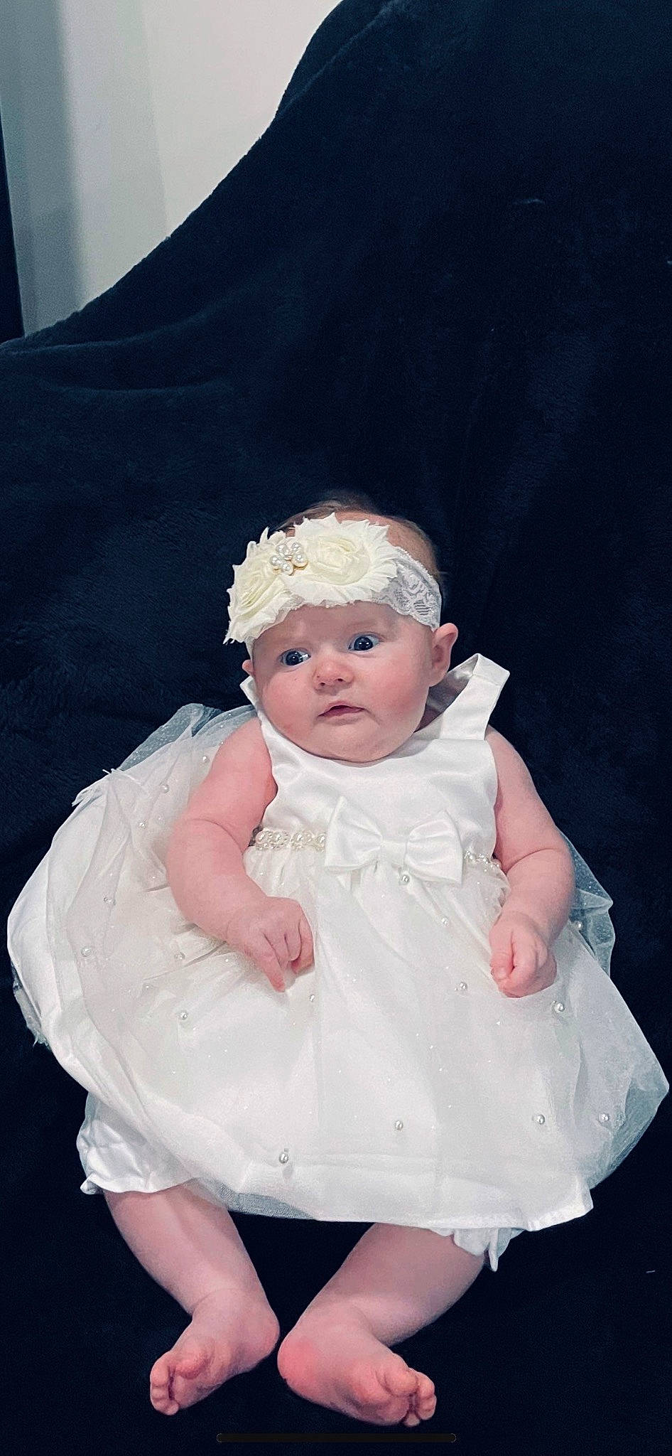Alaya is registered to the contest to win money with this photo: baby, baby_toddler_clothing, bridal_accessory, cheek, comfort, dress, embellishment, fashion_accessory, flash_photography, formal_wear, fun, gesture, hair_accessory, happy, headpiece, headwear, human_body, person, pink, sitting