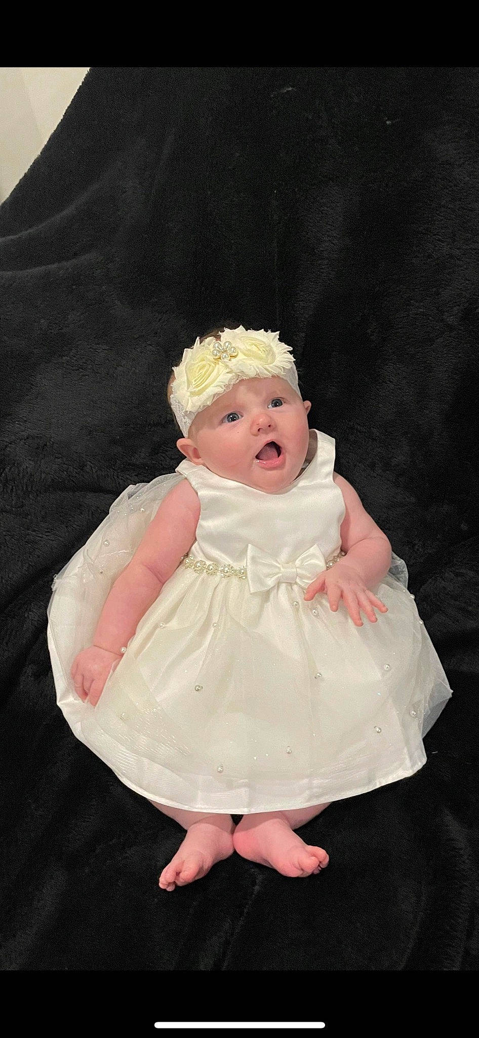 Alaya is registered to the contest to win money with this photo: baby, baby_toddler_clothing, bridal_accessory, cheek, child, costume_hat, day_dress, embellishment, fashion_accessory, flash_photography, fun, gesture, hair_accessory, happy, headpiece, headwear, one_piece_garment, person, pink, sleeve