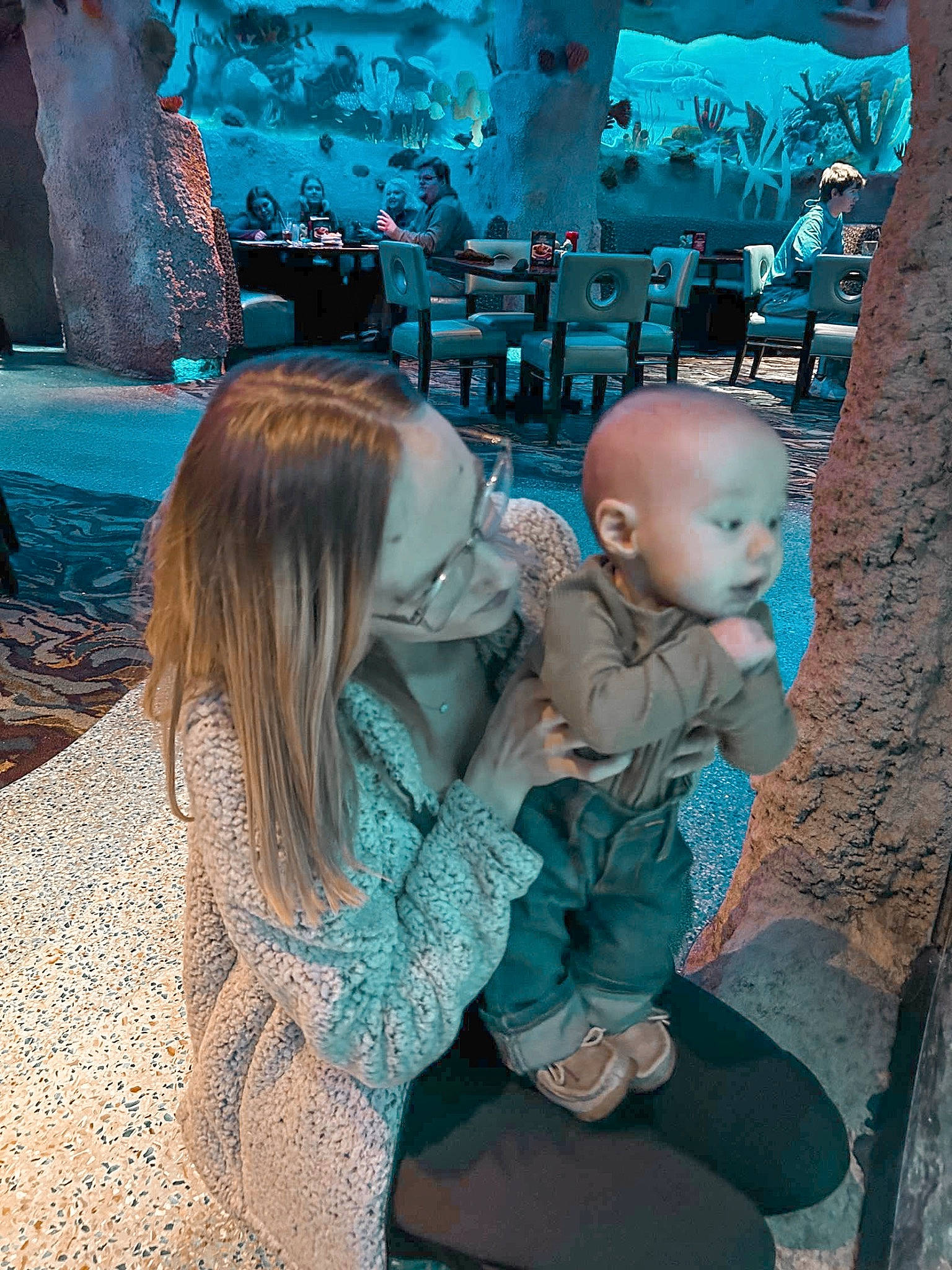 Sterling is registered to the contest to win money with this photo: aqua, azure, baby, blue, child, electric_blue, event, freezing, fun, fur, green, happy, leisure, person, sitting, textile, toddler, tourism, vacation, winter