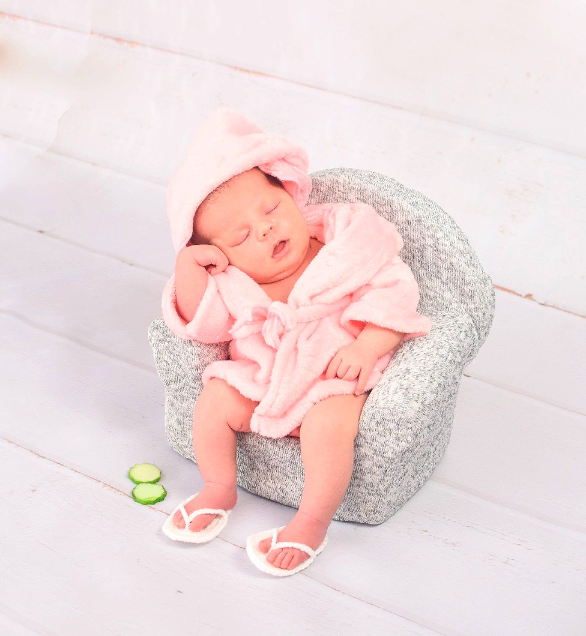 Nathaly is registered to the contest to win money with this photo: baby, baby_toddler_clothing, barefoot, cap, carmine, comfort, floor, flooring, foot, happy, human_leg, knee, linens, magenta, pattern, person, pink, sandal, sitting, thigh