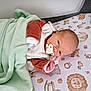 newborn, baby, blanket, pacifier, infant, bed, cute, animal_print, sheet, sleeping, child, soft, cozy, lying_down, indoors, clothing, cute_baby, peaceful, head, face