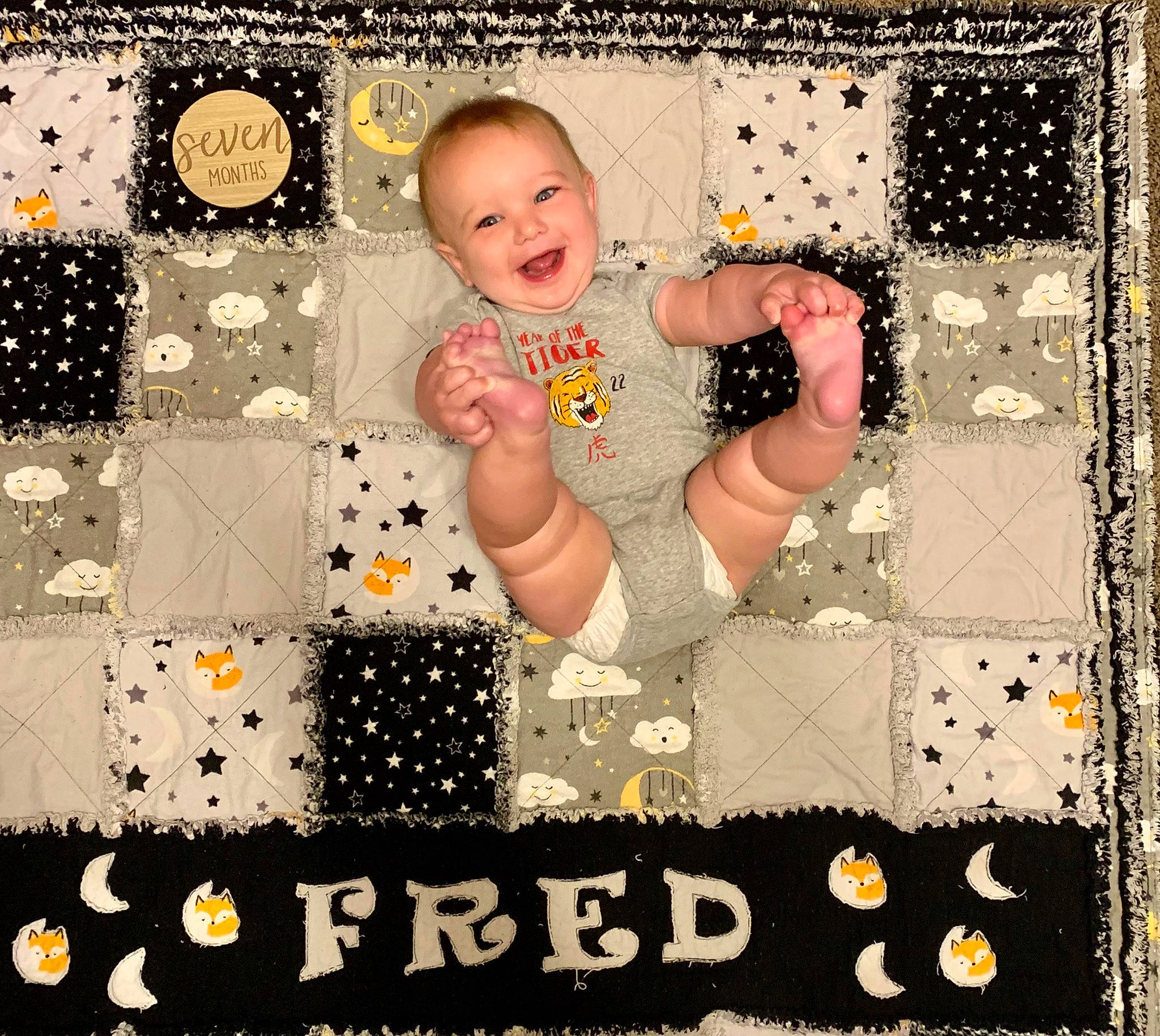 Fred joined the competition — help win amazing prizes! art, baby, baby_toddler_clothing, child, circle, creative_arts, design, flooring, font, happy, joy, linens, pattern, people_in_nature, person, play, rectangle, smile, stock_photography, textile
