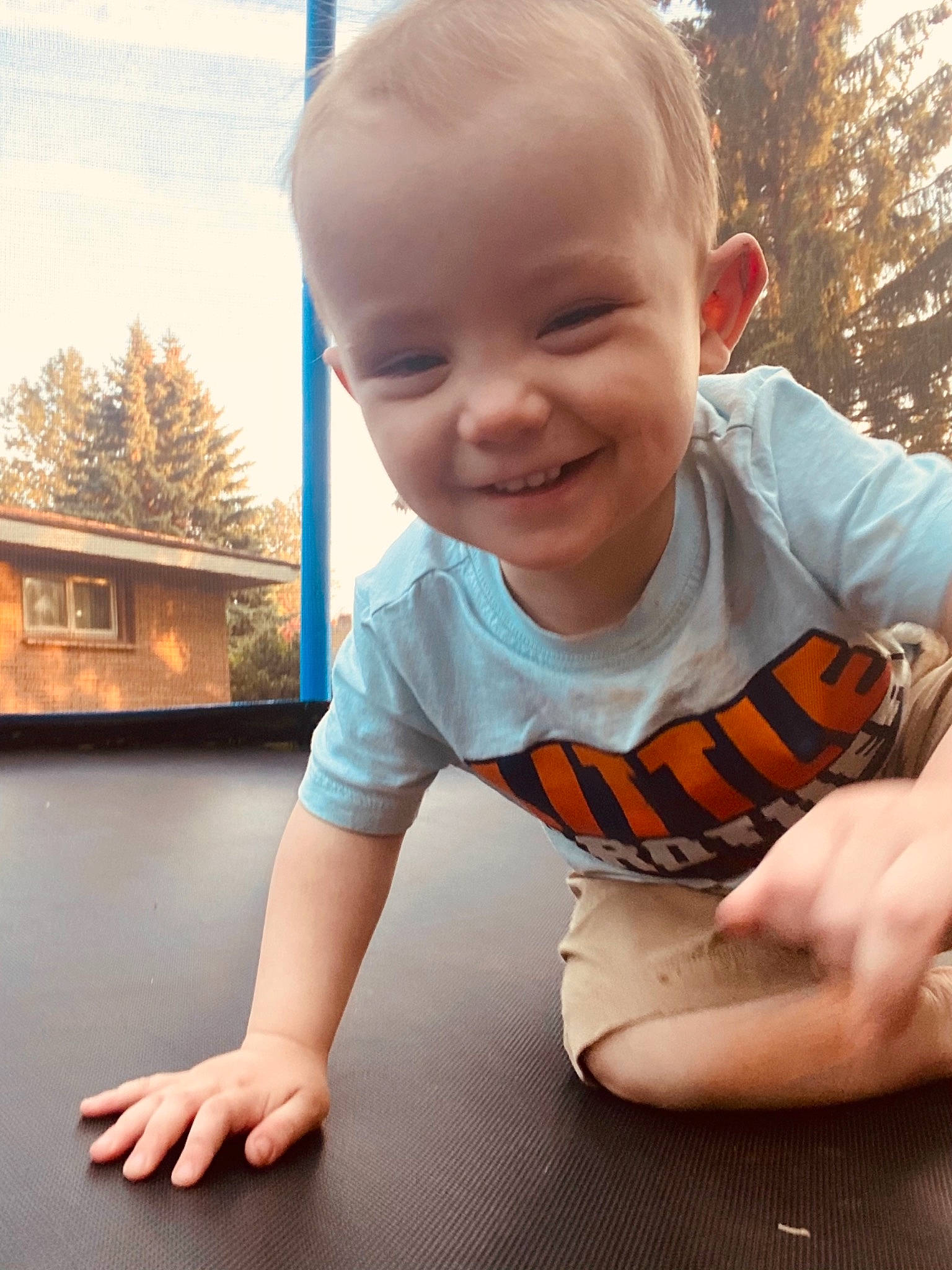 Greysen joined the competition — help win amazing prizes! baby, baby_toddler_clothing, cheek, chin, face, finger, flooring, hand, happy, human_body, joy, mouth, nose, person, skin, sleeve, smile, standing, t_shirt, toddler