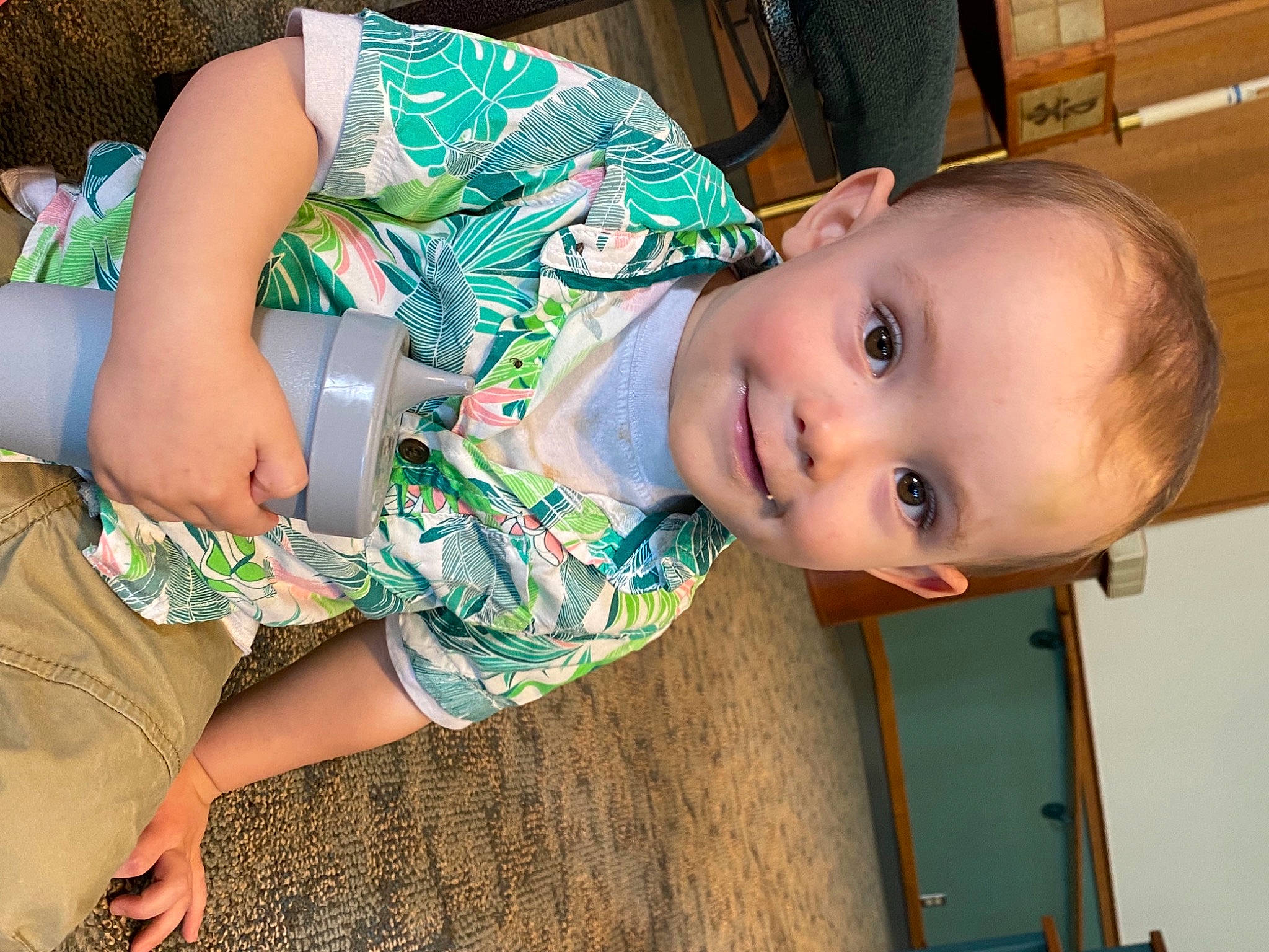 Greysen is registered to the contest to win money with this photo: baby, baby_toddler_clothing, cheek, child, elbow, fun, happy, joint, joy, leisure, mouth, neck, nose, pattern, person, sitting, skin, smile, thigh, toddler