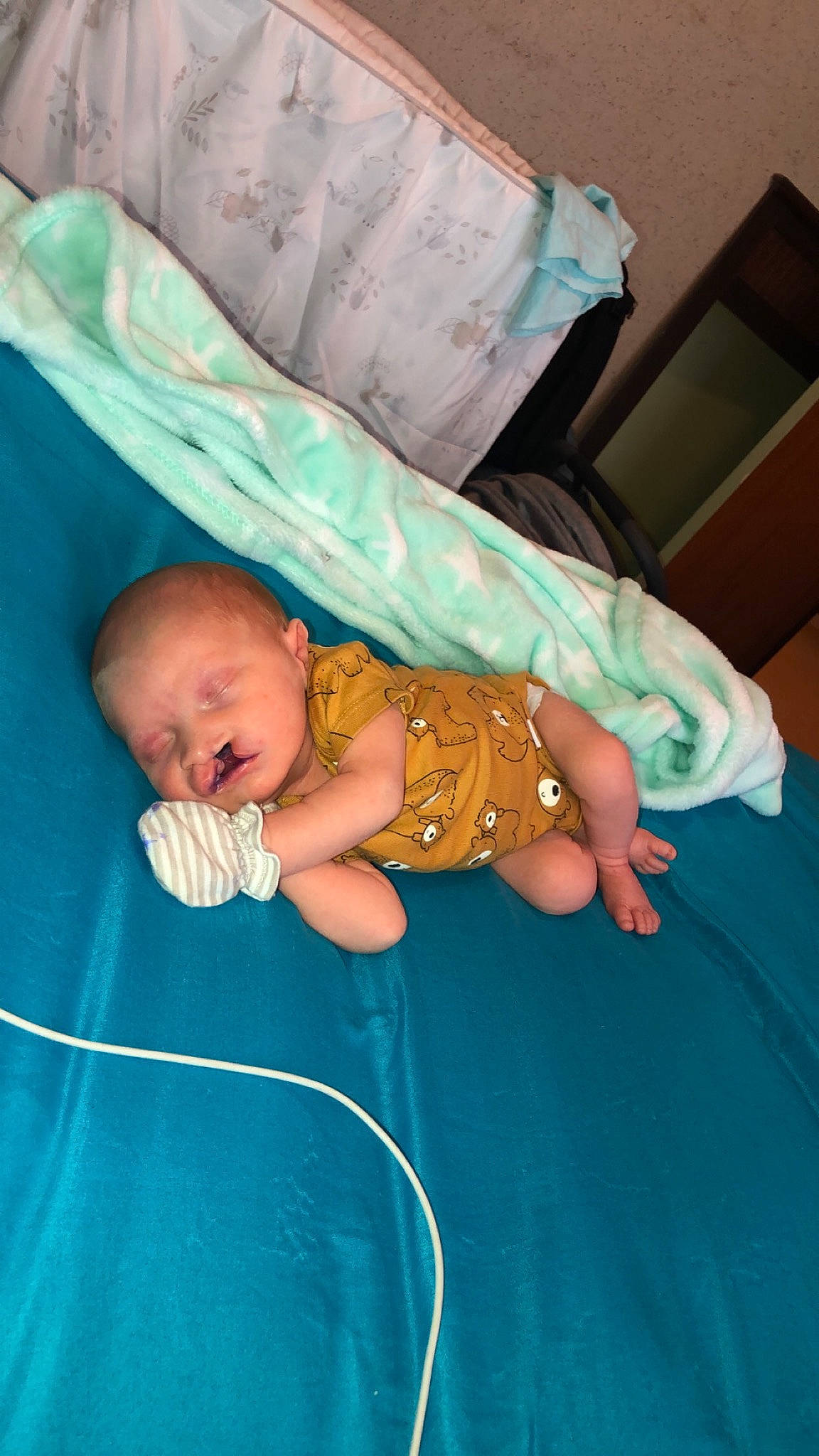 Carson is registered to the contest to win money with this photo: baby, birth, child, person, skin, sleep, toddler, turquoise