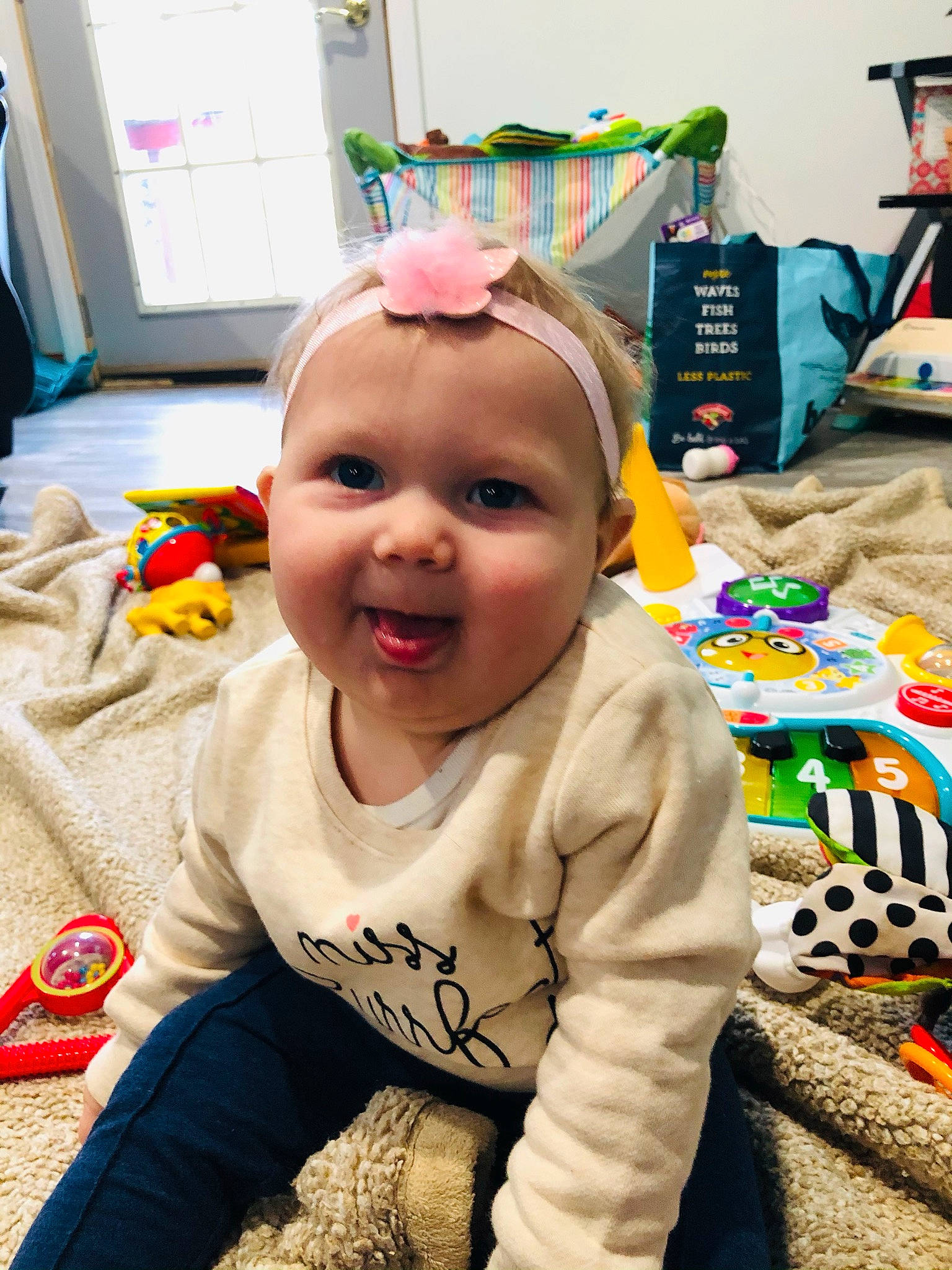 Brielle joined the competition — help win amazing prizes! baby, baby_toddler_clothing, baby_toys, cheek, child, event, flooring, fun, fur, happy, holiday, party, person, play, room, sitting, smile, toddler, toy, vacation