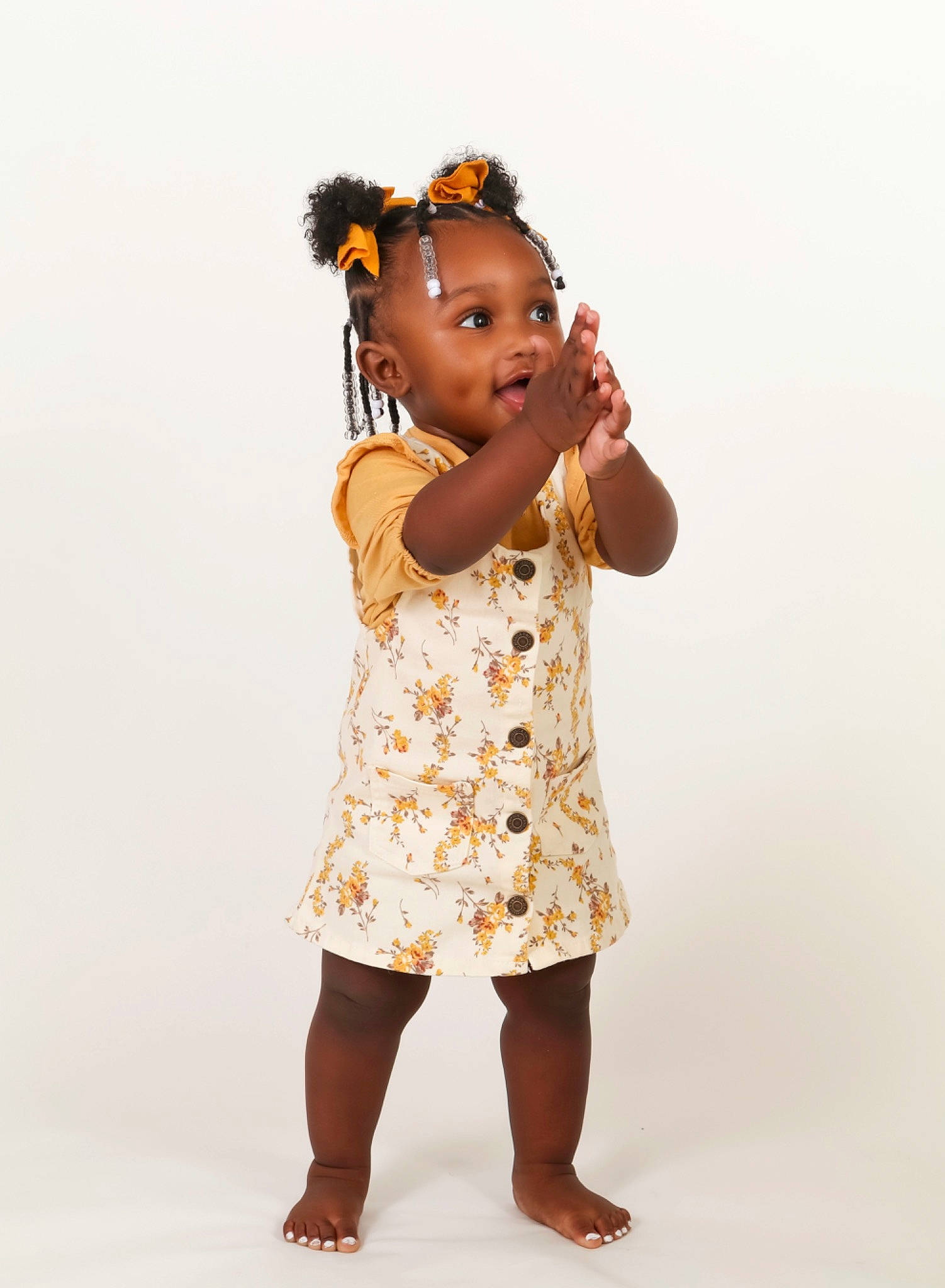 Amari joined the competition — help win amazing prizes! baby_toddler_clothing, barefoot, black_hair, child, day_dress, elbow, fashion_design, finger, fun, gesture, happy, human_leg, neck, one_piece_garment, pattern, person, photo_shoot, sleeve, thumb, toddler