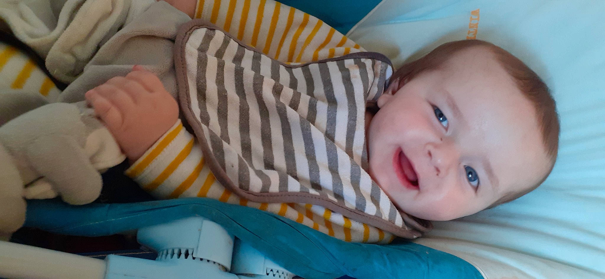 Thiago participe au concours pour gagner de l'argent avec cette photo : baby, baby_products, baby_toddler_clothing, cheek, child, comfort, couch, happy, human, iris, mouth, nose, organ, person, product, room, skin, smile, textile, toddler